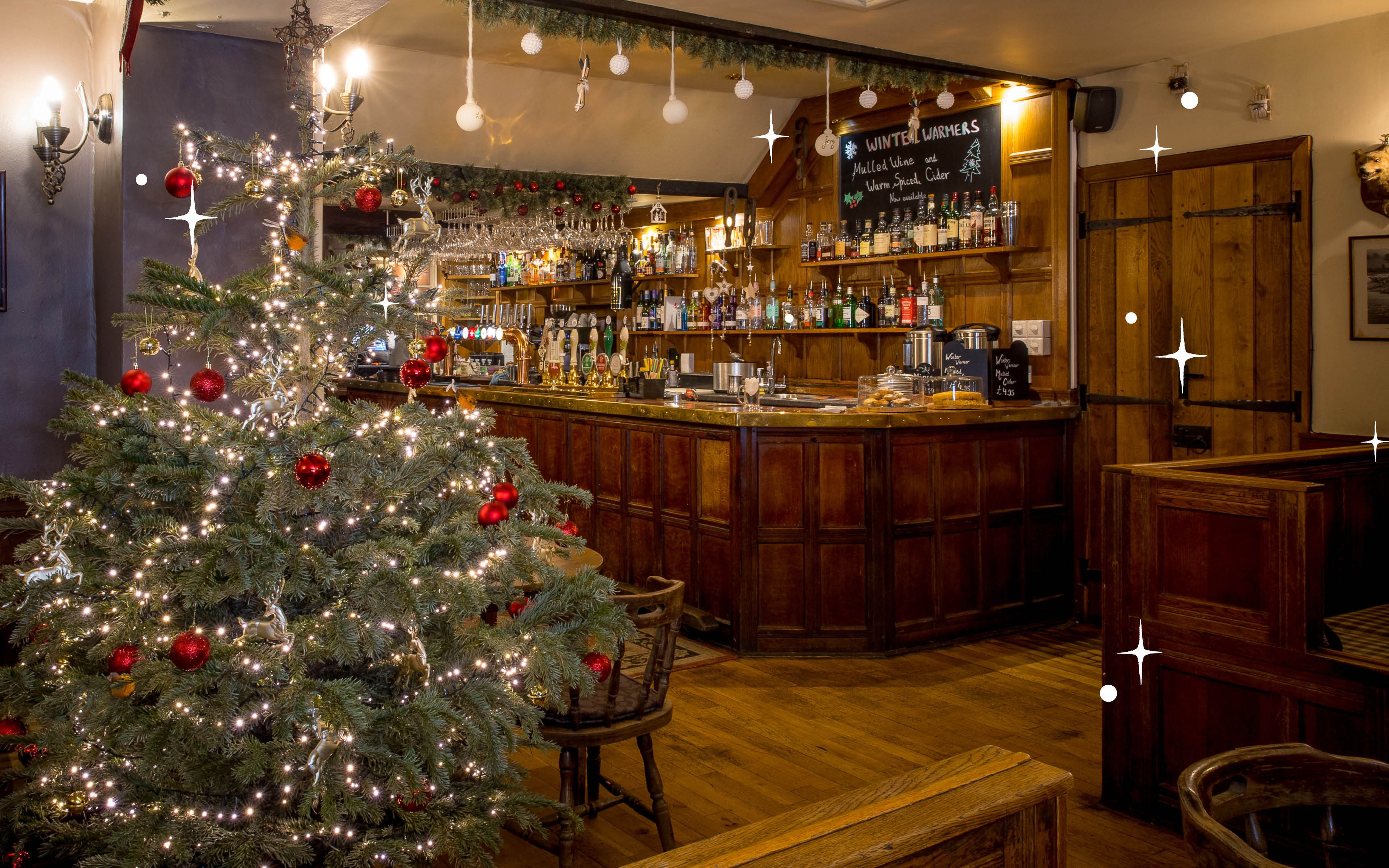 christmas tree in front of the bar